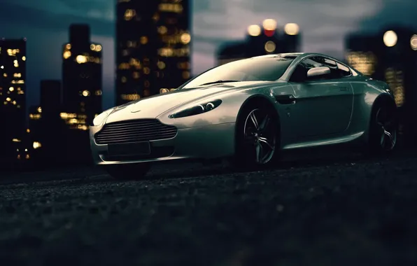 Картинка Aston Martin, фары, здания, колеса, сумерки