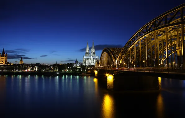 Картинка мост, отражение, река, здания, вечер, Германия, подсветка, архитектура, Germany, Кёльн, Cologne, Рейн, Koln